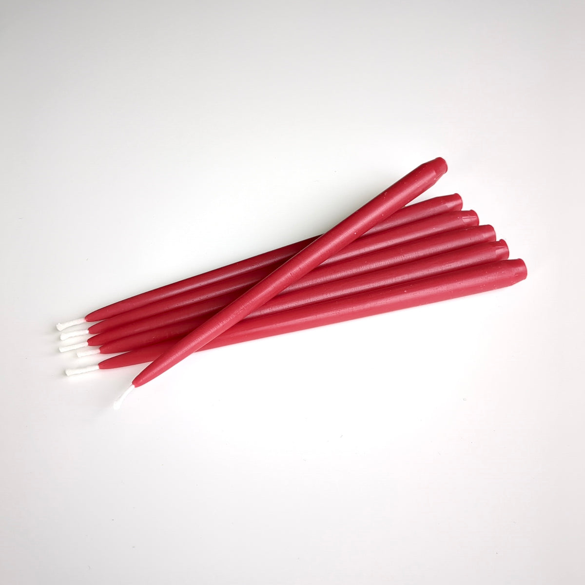 bougies naturelles rouges en cire d'abeille, fabrication artisanale française, racines artisanat